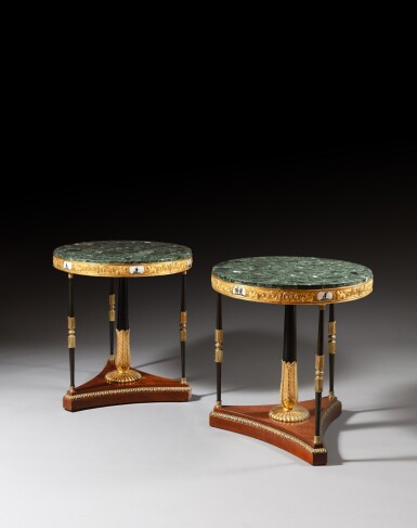 View full screen - View 1 of Lot 24. A pair of patinated and gilt-bronze mounted mahogany, giltwood, painted wood and porcelain guéridons, probably Russian, Saint-Petersburg, circa 1810.