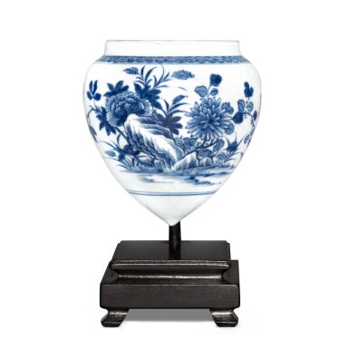 View full screen - View 1 of Lot 7. A blue and white soft-paste 'floral' bird feeder, Qing dynasty, 18th century.