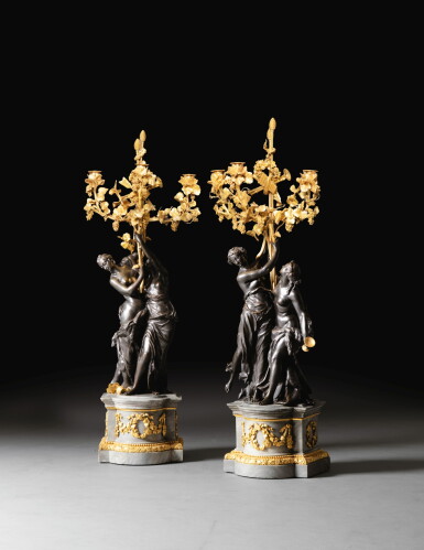 View full screen - View 1 of Lot 25. A pair of Louis XVI patinated gilt-bronze candelabra, circa 1785 | Paire de grands candélabres en bronze patiné et doré d'époque Louis XVI, vers 1785.