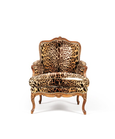 View full screen - View 1 of Lot 133. A LOUIS XV CARVED BEECHWOOD BERGÈRE BY PIERRE OR LOUIS FALCONET, CIRCA 1750 | BERGÈRE EN HÊTRE SCULPTÉ D'ÉPOQUE LOUIS XV, VERS 1750, PAR PIERRE OU LOUIS FALCONET.