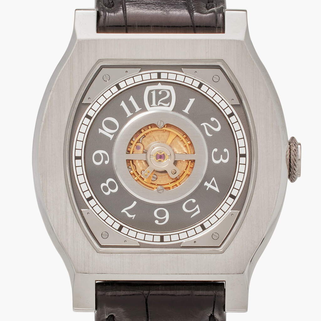 View full screen - View 1 of Lot 13. Vagabondage I | A limited edition platinum semi-skeletonized wristwatch with wandering minutes and hours display, Circa 2006.