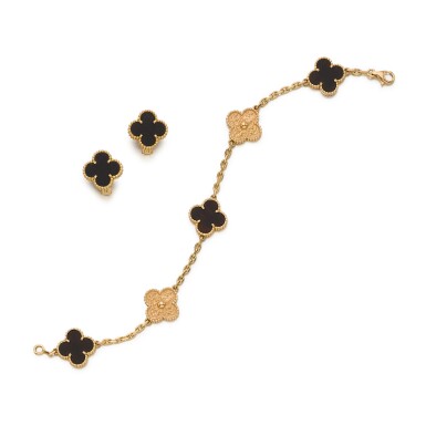 View full screen - View 1 of Lot 156. Wood Bracelet and Pair of Wood Earrings, 'Alhambra' .