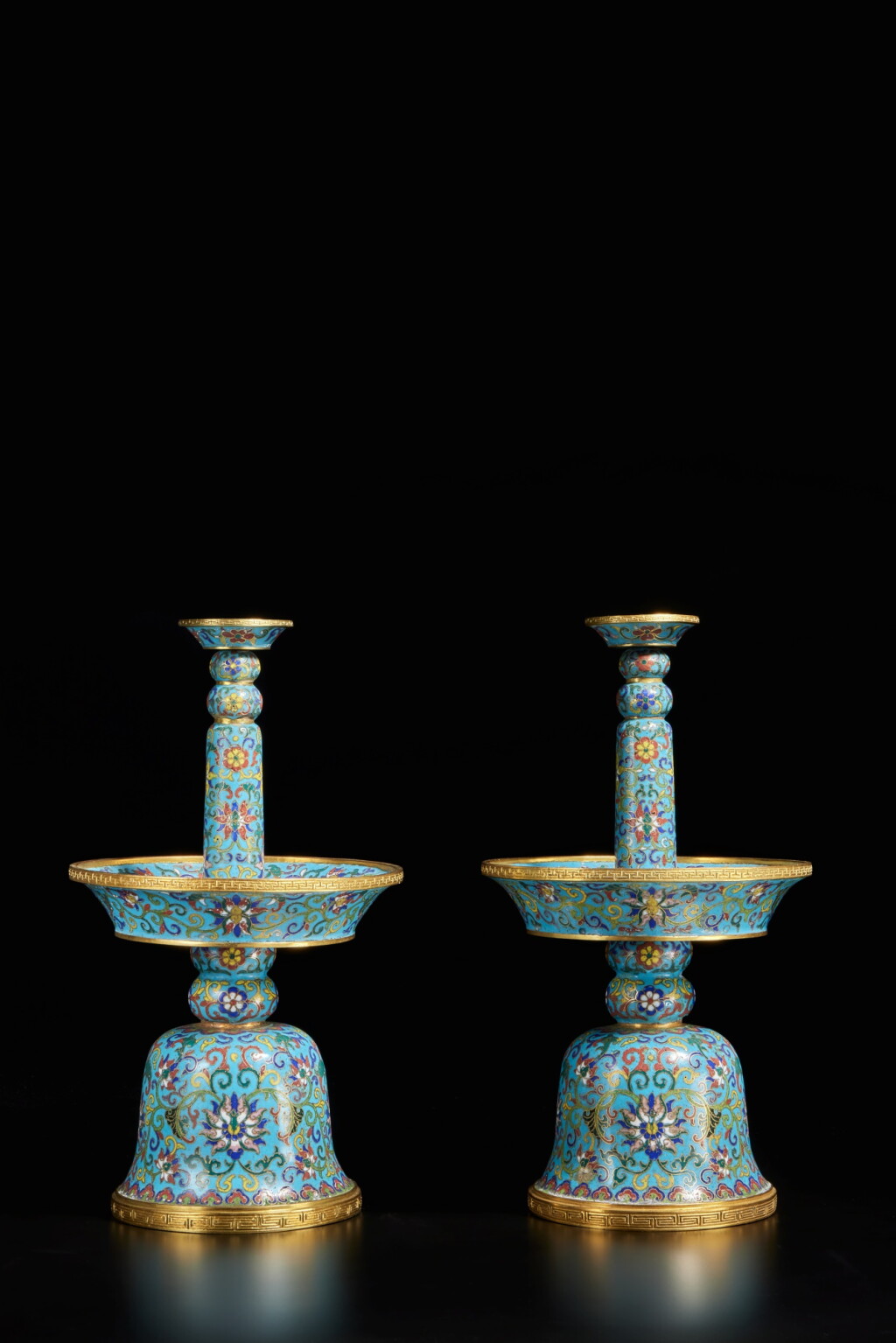View full screen - View 1 of Lot 111. A pair of cloisonné enamel 'lotus' candlesticks, Marks and period of Qianlong.