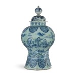 A DUTCH DELFT BLUE AND WHITE OCTAGONAL BALUSTER VASE AND COVER, LATE 17TH CENTURY