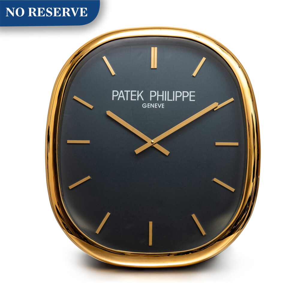 View full screen - View 1 of Lot 8050. Inducta manufacture for Patek Philippe, A gilt wall clock, Circa 1990 | Inducta manufacture 為百達翡麗而製 | 鍍金銅製掛牆鐘,約1990年製.