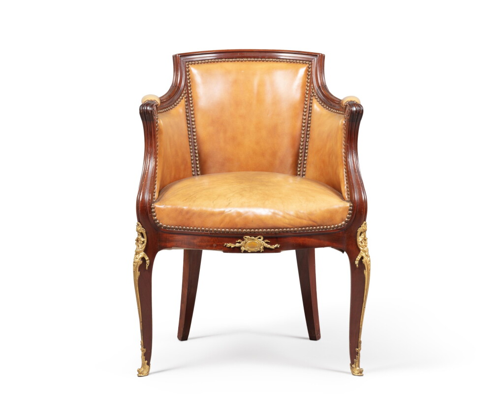 View full screen - View 1 of Lot 110. A mahogany and gilt bronze desk armchair François Linke (1855-1946) | Fauteuil de bureau en acajou et bronze doré.