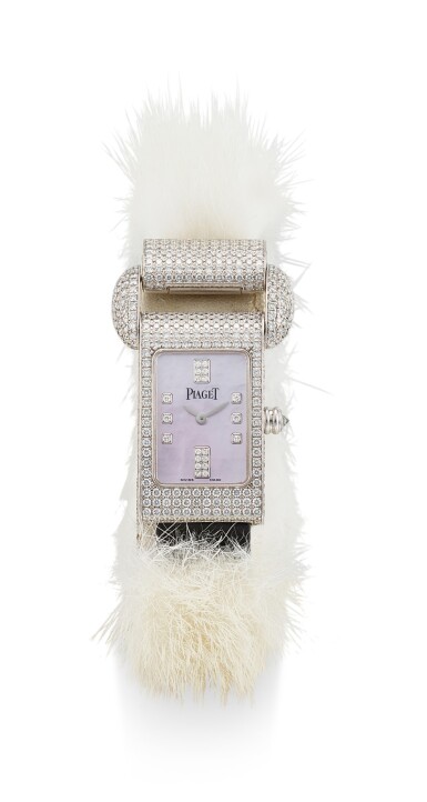 View full screen - View 1 of Lot 8240. PIAGET | MISS PROTOCOLE, REFERENCE P10038, A WHITE GOLD AND DIAMOND-SET WRISTWATCH WITH MOTHER-OF-PEARL DIAL, CIRCA 2000.