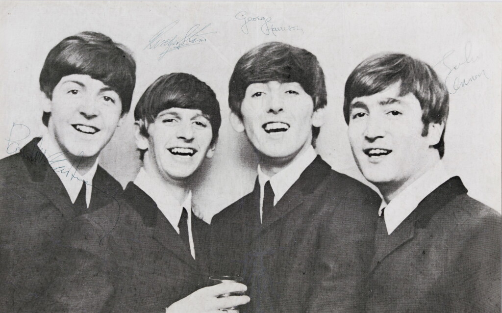View full screen - View 1 of Lot 2. THE BEATLES | photograph signed by all four Beatles, 1964.
