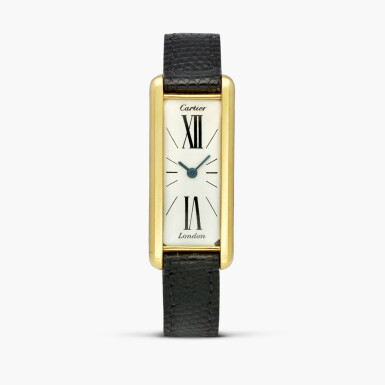 View full screen - View 1 of Lot 2387. Tank J.J.C. Allongée | A yellow gold elongated rectangular rear-wound wristwatch, Circa 1970-71 .