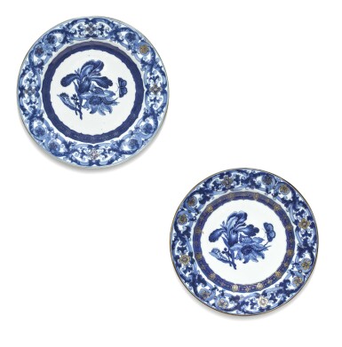 View full screen - View 1 of Lot 207. A pair of blue and white and gilt 'botanical' plates, Qing dynasty, 18th century.