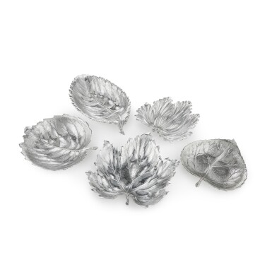 View full screen - View 1 of Lot 49. A Group of Five Italian Silver Leaf-Form Dishes, Buccellati, Milan and Bologna, Modern.