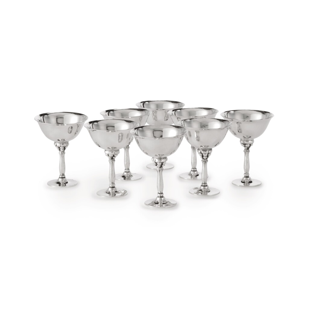 View full screen - View 1 of Lot 11. A SET OF EIGHT DANISH SILVER COCKTAIL GLASSES, NO. 479A, DESIGNED BY HARALD NIELSEN, GEORG JENSEN SILVERSMITHY, COPENHAGEN, 20TH CENTURY.