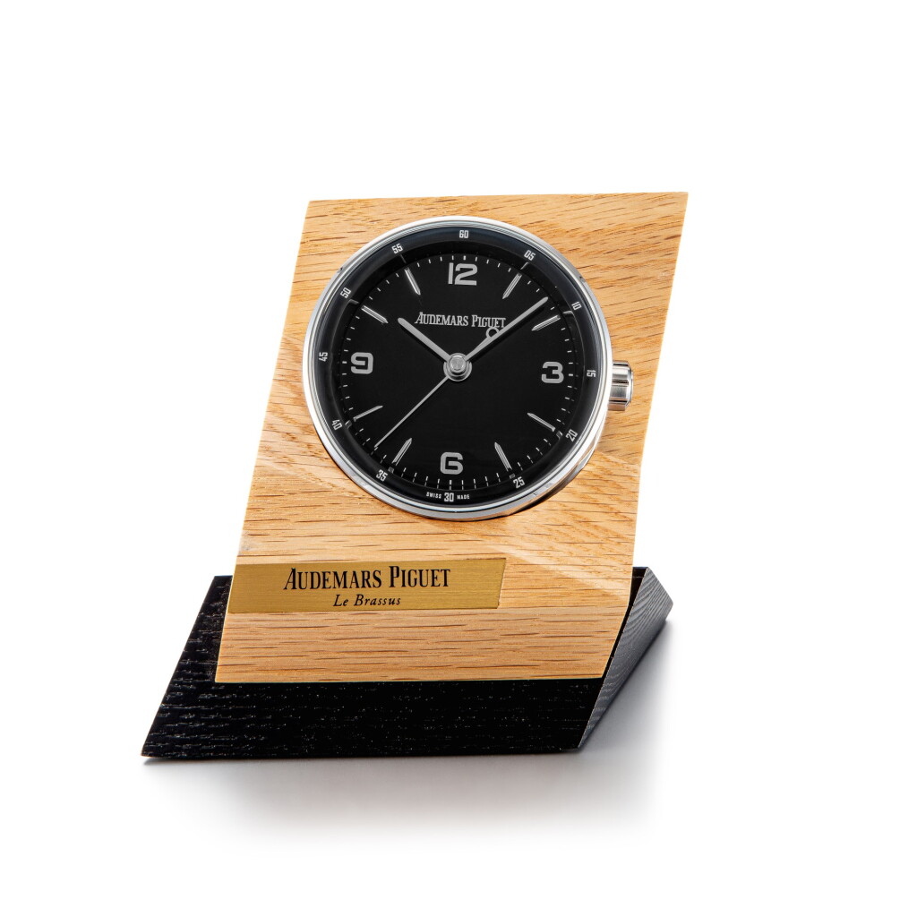 View full screen - View 1 of Lot 8093. Code 11.59 | A stainless steel alarm desk clock with wooden stand, Circa 2019 | 愛彼 | Code 11.59 | 精鋼鬧鐘,備木製展示座,約2019年製.