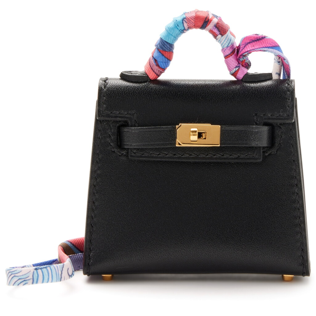 View full screen - View 1 of Lot 106. Black Tadelakt Micro Mini Twilly Kelly Charm Gold Hardware, 2022.