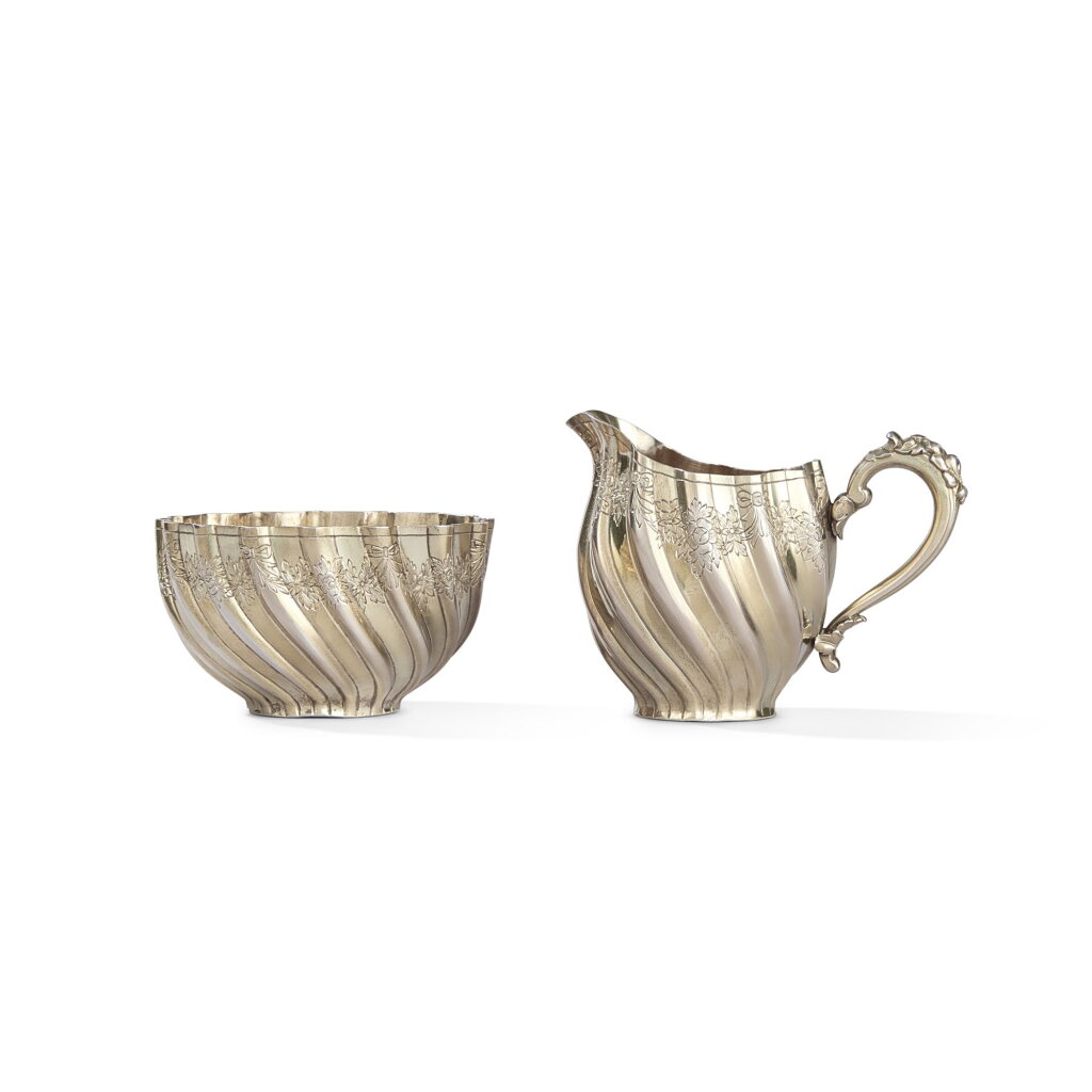View full screen - View 1 of Lot 1257. A parcel-gilt silver sugar bowl and cream jug, St Petersburg, 1890.