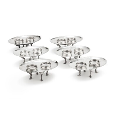 View full screen - View 1 of Lot 163. A set of six silver double salt cellars, four by Henry Auguste, Paris, 1789, the other two probably Italian, only stamped with the CM maker's mark, slightly later | Ensemble de six salières doubles en argent, quatre par Henry Auguste, Paris, 1789, les deux autres probablement italiennes, uniquement insculpées du poinçon d'orfèvre CM, légèrement postérieures.