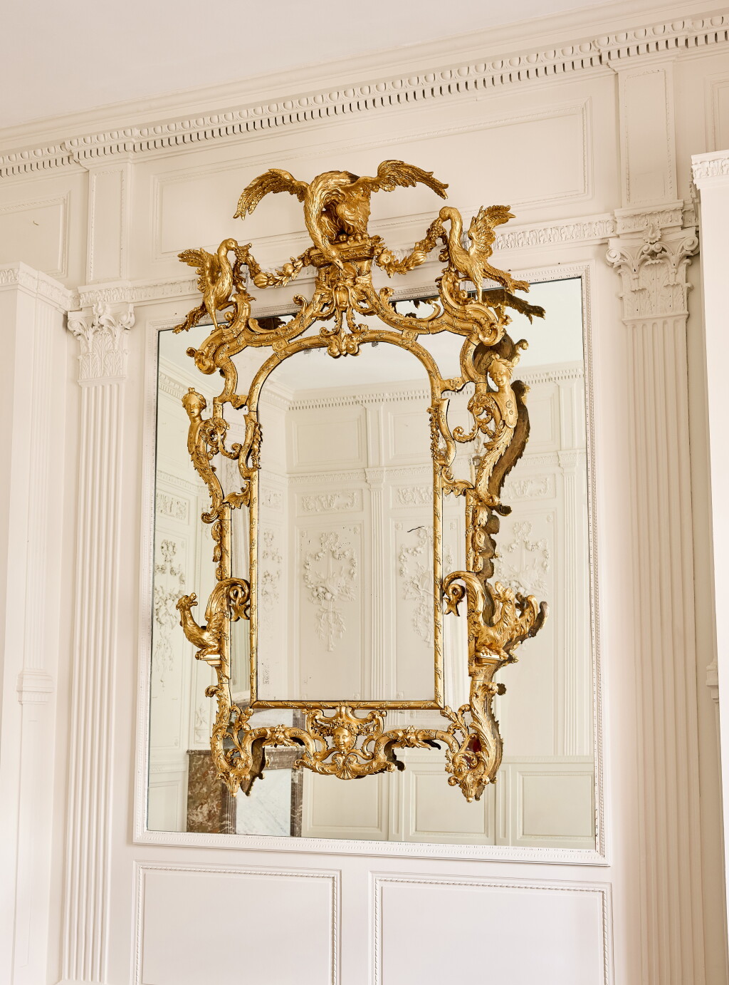 View full screen - View 1 of Lot 515. A North Italian giltwood mirror, circa 1720, after Jean-Bernard-Honoré Turreau.