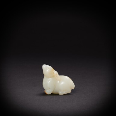 View full screen - View 1 of Lot 9479. A white and russet jade rabbit, Qing dynasty, 19th century | 清十九世紀 白玉兔.