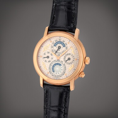 View full screen - View 1 of Lot 381. Jules Audemars Quantième Perpétuel Métropolis, Reference 25919OR/O/0002CR/01 | A pink gold world time perpetual calendar wristwatch with leap year indication | Circa 2002.
