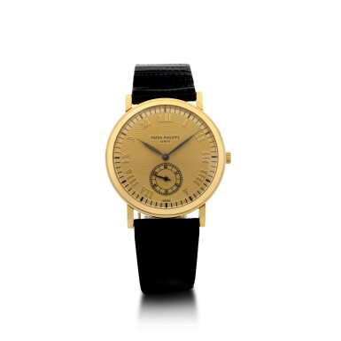View full screen - View 1 of Lot 158. PATEK PHILIPPE | REFERENCE 5022 A YELLOW GOLD WRISTWATCH, MADE IN 1997.