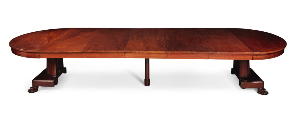 View full screen - View 1 of Lot 99. A German Neoclassical Mahogany Dining Table, Early 19th Century.