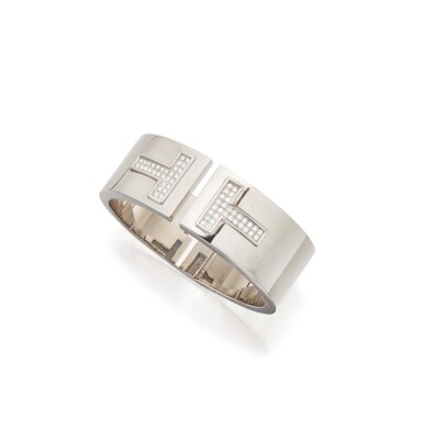 View full screen - View 1 of Lot 12. WHITE GOLD AND DIAMOND 'T' CUFF-BRACELET, TIFFANY & CO..