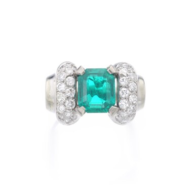 View full screen - View 1 of Lot 134. EMERALD AND DIAMOND RING.
