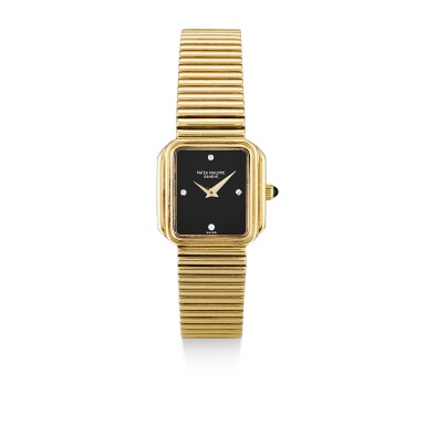 View full screen - View 1 of Lot 150. PATEK PHILIPPE | REFERENCE 4429/1, A YELLOW GOLD AND DIAMOND-SET BRACELET WATCH WITH ONYX DIAL, MADE IN 1980.
