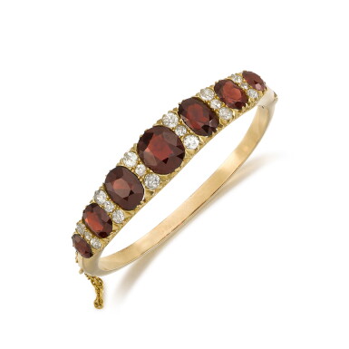 View full screen - View 1 of Lot 19. Garnet and diamond bangle, late 19th century.
