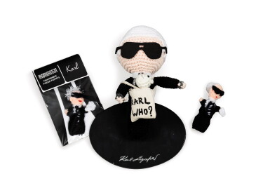 View full screen - View 1 of Lot 410. Set of three Karl Lagerfeld figurines Ensemble de trois figurines à l'effigie de Karl Lagerfeld.