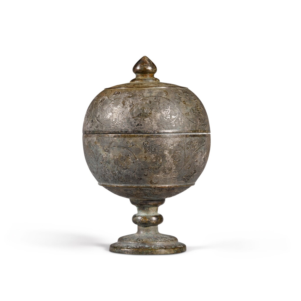 View full screen - View 1 of Lot 305. A silver 'flower and bird' cup and cover, Tang dynasty 唐 銀鏨花鳥紋高足蓋盃.