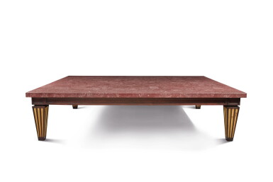 View full screen - View 1 of Lot 313. A LARGE LOW TABLE WITH A RED PORPHYRY VENEERED TOP.
