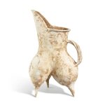 A large white pottery tripod ewer Longshan culture, c. 2500-2000 B.C. 龍山文化 白陶鬹