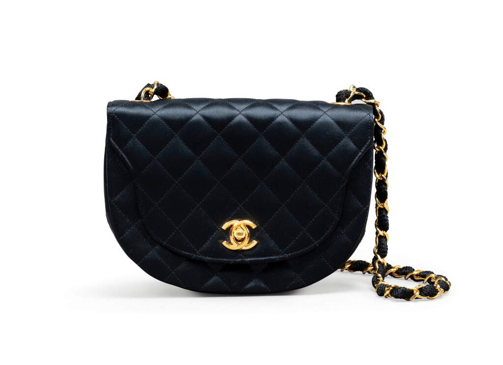 View full screen - View 1 of Lot 28. Black Satin Single Flap Bag Gold Hardware, 1988.