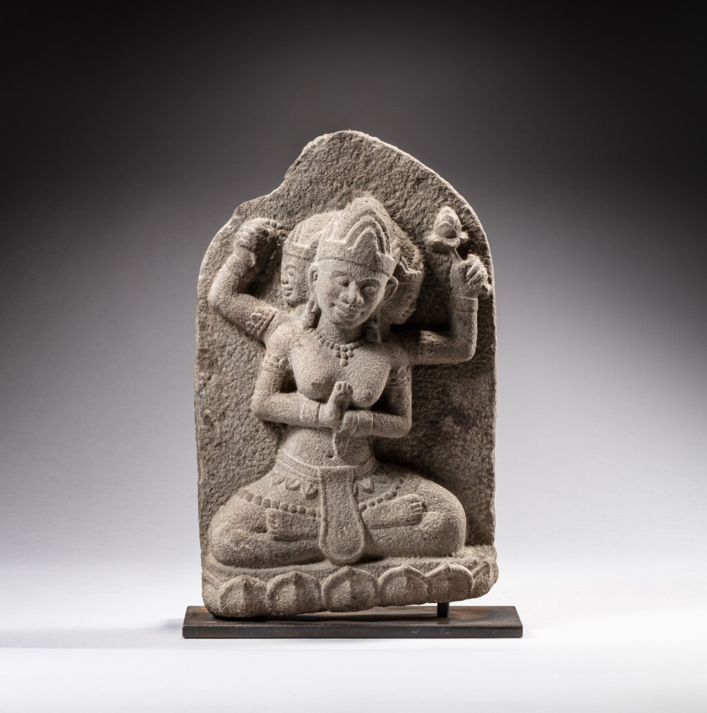 View full screen - View 1 of Lot 111. A stone figure of Brahma, Vietnam, probably Champa, ca. 13th century | 越南或占城 約十三世紀 石雕薩拉薩瓦蒂坐像.