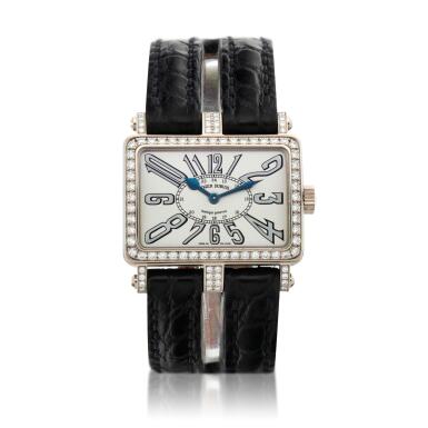 View full screen - View 1 of Lot 82. Too Much A limited edition white gold and diamond-set rectangular wristwatch, Circa 2006.