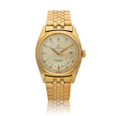 View full screen - View 1 of Lot 214. Reference 6030 Oyster Perpetual, A yellow gold wristwatch with date and bracelet, Circa 1961.