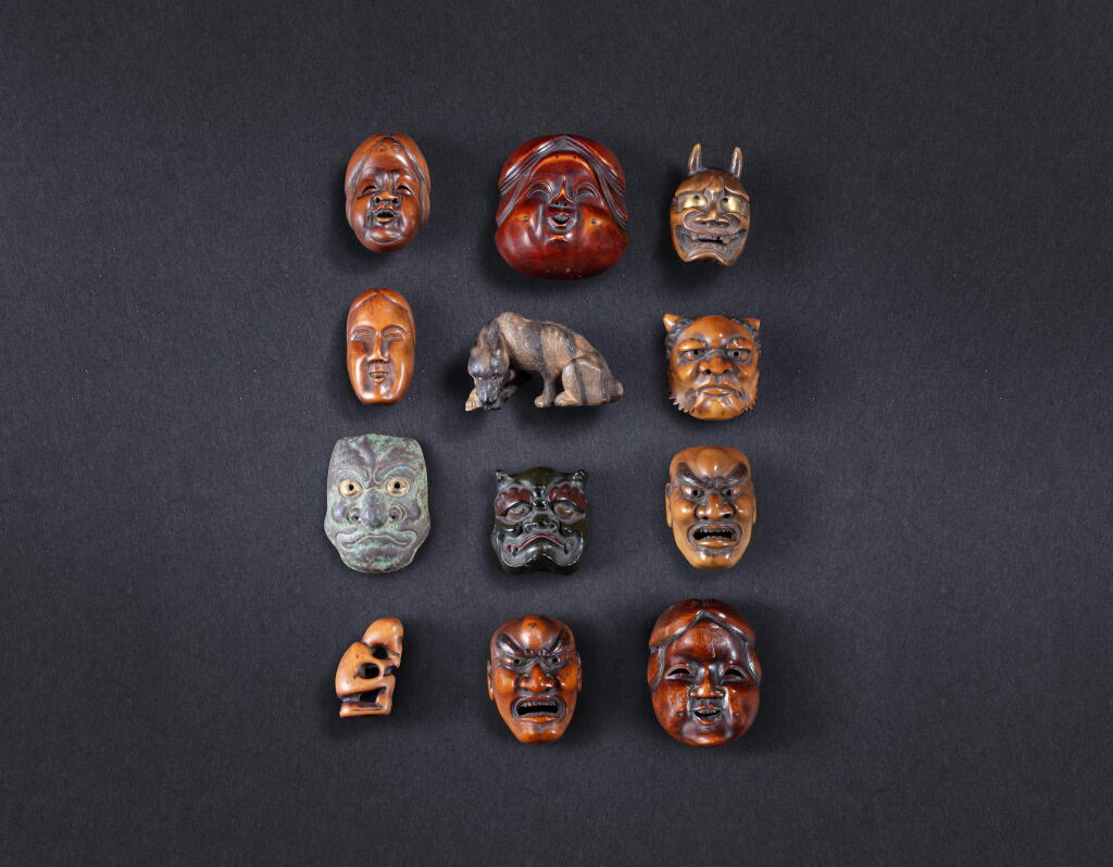 View full screen - View 1 of Lot 317. A group of twelve wood and copper-alloy netsuke, Japan, 19th century.