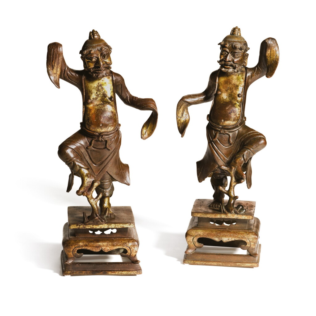 View full screen - View 1 of Lot 616. A RARE PAIR OF PARCEL-GILT BRONZE FIGURES OF DANCING FOREIGNERS, MING DYNASTY, DATED JIAJING BINGYIN YEAR, CORRESPONDING TO 1566.