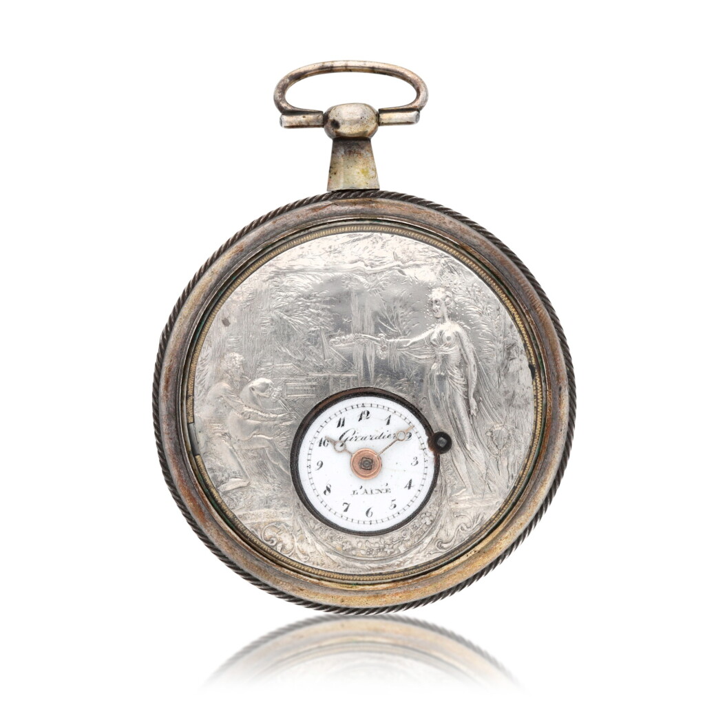 View full screen - View 1 of Lot 173. A silver single-cased verge watch with polychrome enamel painted erotic scene concealed beneath the dial Circa 1810, no. 6496.