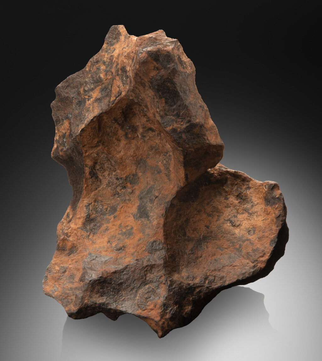 View full screen - View 1 of Lot 113. Henbury Meteorite — Complete Sculptural Tabletop Meteorite From Renowned Australian Meteorite Shower.