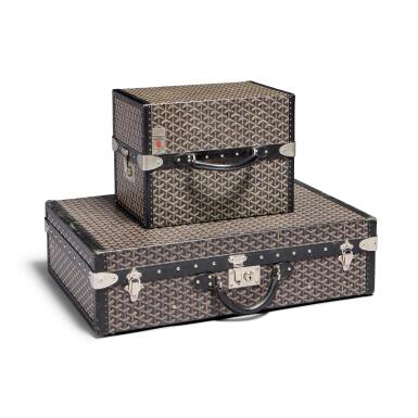 View full screen - View 1 of Lot 173. Set of Two Black Goyardine Canvas Hôtel 70 Case Silver Hardware, 2007 and Vintage Black Goyardine Canvas Library Trunk Silver Hardware.