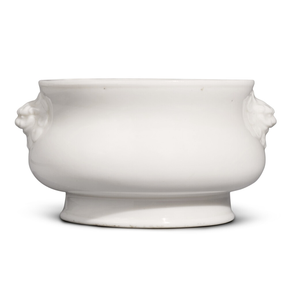 View full screen - View 1 of Lot 321. A 'Dehua' bombe-form censer, Qing dynasty, Kangxi period | 清康熙 德化白釉鋪首耳簋式爐 《□元□□》款.