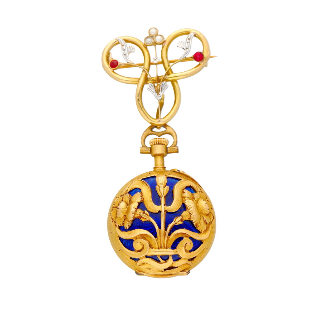 View full screen - View 1 of Lot 129. A lady's gold and enamel lapel watch with associated pin, Circa 1920.