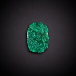 A green glass 'chilong' belt buckle, Qing dynasty, 18th - 19th century | 清十八至十九世紀 綠料螭龍紋帶扣