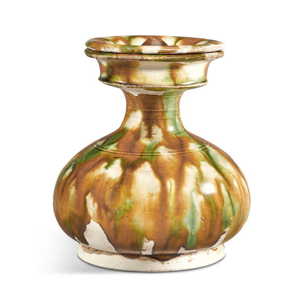 View full screen - View 1 of Lot 10. A rare sancai-glazed vase and cover, Tang dynasty.
