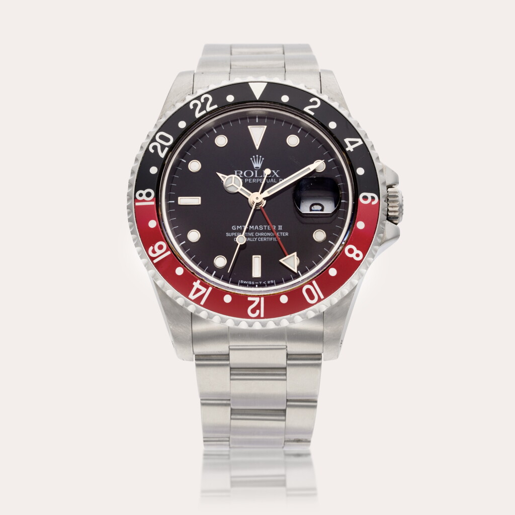View full screen - View 1 of Lot 664. Reference 16710 GMT-Master II ‘Coke’ | A stainless steel automatic dual time wristwatch with date and bracelet, Circa 1989.