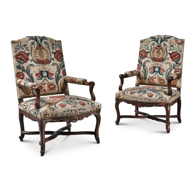View full screen - View 1 of Lot 59. A Pair of Régence Needlework Upholstered Carved Walnut Fauteuils à la Reine, Circa 1725.