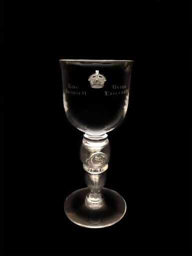 View full screen - View 1 of Lot 20. An engraved glass coin goblet celebrating the coronation of King George VI and Queen Elizabeth, 1937.