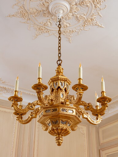 View full screen - View 1 of Lot 66. A Louis XIV giltwood and mirror plaques eight-light chandelier, circa 1700 (reglit) | Lustre à huit bras de lumières en bois redoré et plaques de miroir d'époque Louis XIV, vers 1700.
